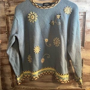 Elegant Blue Sweater with Yellow Floral Accents